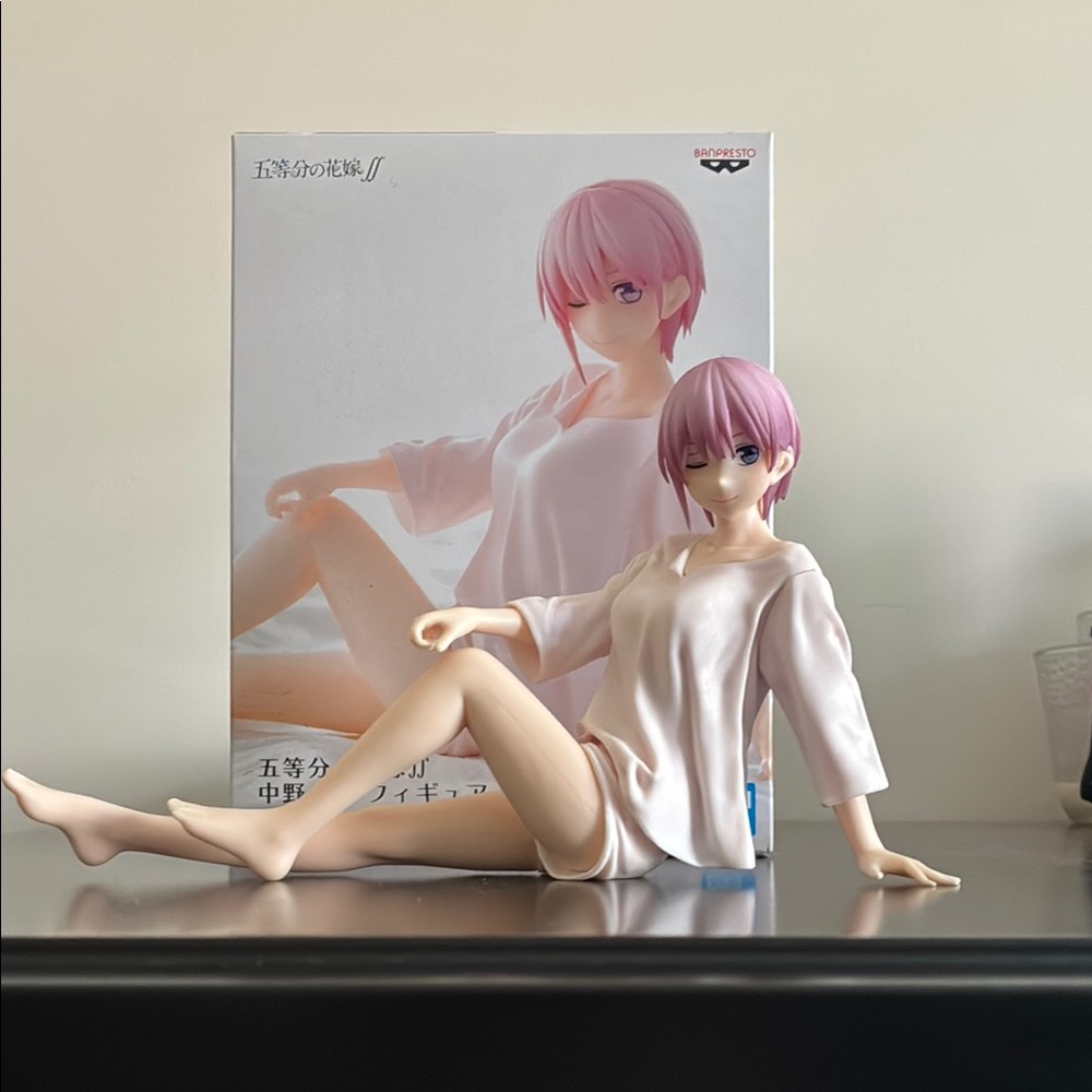 Anime Figure with Pink Hair and White Dress